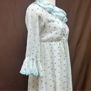 Maxi Polk a dot dress with exaggerated collar and bell sleeves